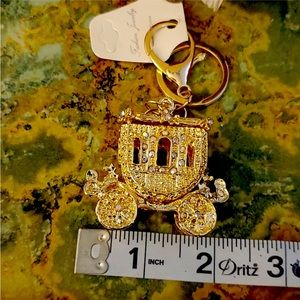New gold, rhinestone carriage bling out your purse, or use it as a keychain